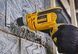 Дрель с ударом DeWALT DWD024